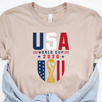 2026 FIFA World Cup USA themed graphic t-shirt in white with bold red and blue soccer fan print